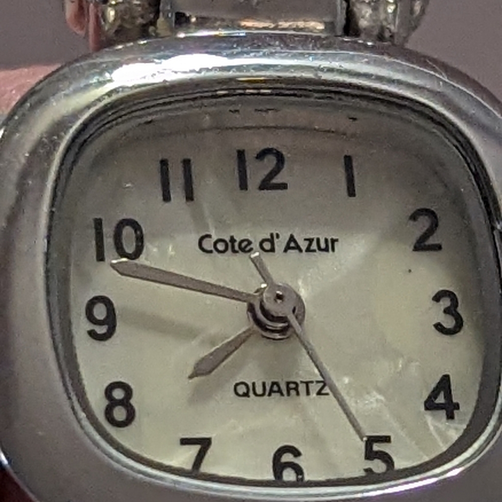 Stainless steel jewelry cuff watch.